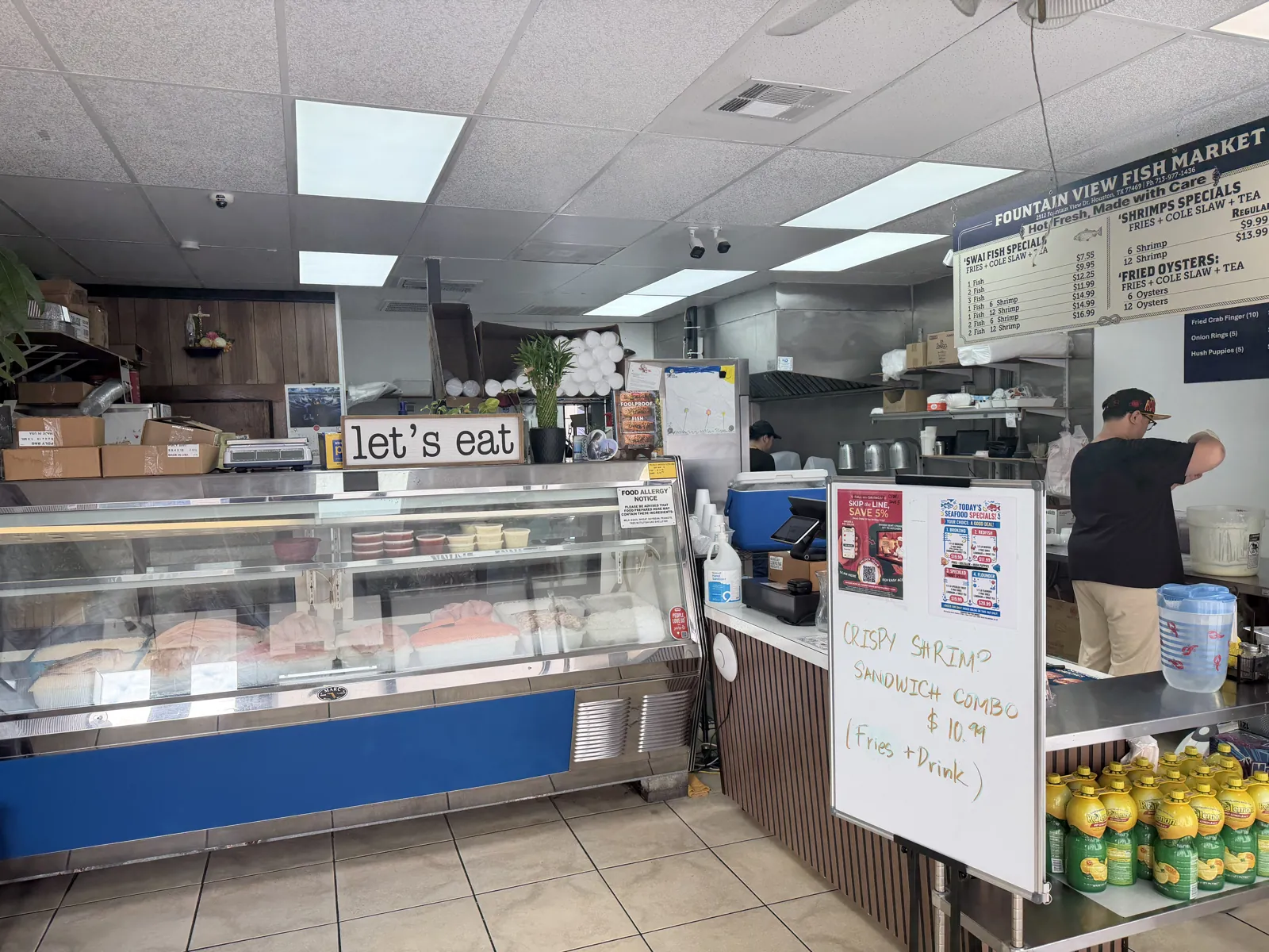The refrigerated seafood case at Fountain View Fish Market in Houston